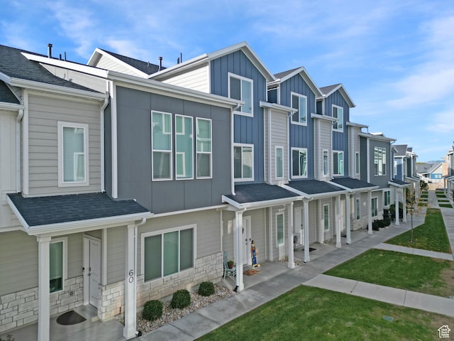 290 E 1825 N Unit 58, North Ogden, UT 84414 - multi unit property featuring a residential view, a porch, board and batten siding, a front yard, and stone siding