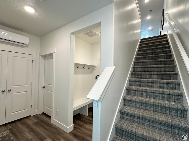 290 E 1825 N Unit 58, North Ogden, UT 84414 - stairs featuring wood finished floors, a wall unit AC, and baseboards