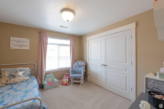 373 S State St Unit 10, Provo, UT 84606 - bedroom with light carpet and a closet
