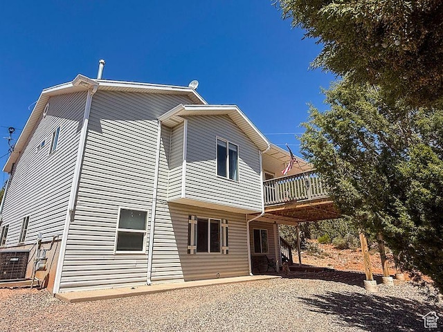 425 E Mule Deer Rd, Central, UT 84722 - view of side of home featuring a deck and cooling unit