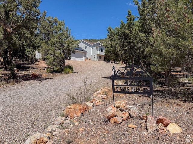 425 E Mule Deer Rd, Central, UT 84722 - view of front facade with driveway and a garage