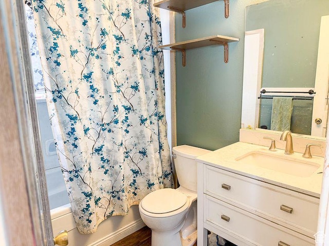 425 E Mule Deer Rd, Central, UT 84722 - full bathroom with toilet, vanity, shower / bath combo with shower curtain, and wood finished floors