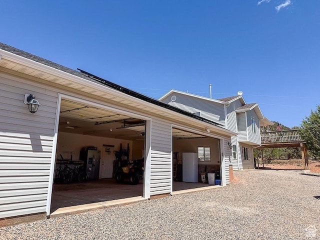 425 E Mule Deer Rd, Central, UT 84722 - view of property exterior featuring a garage and gravel driveway