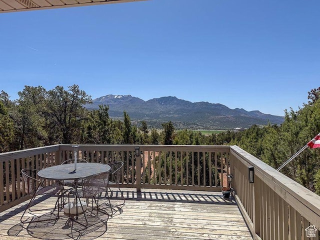 425 E Mule Deer Rd, Central, UT 84722 - wooden deck featuring a mountain view and outdoor dining space