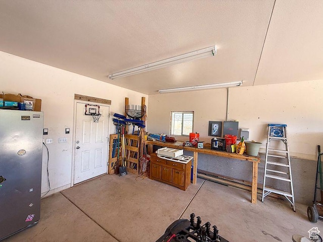 425 E Mule Deer Rd, Central, UT 84722 - garage featuring freestanding refrigerator
