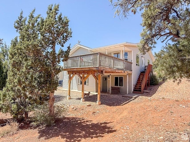 425 E Mule Deer Rd, Central, UT 84722 - back of house featuring a deck and stairway
