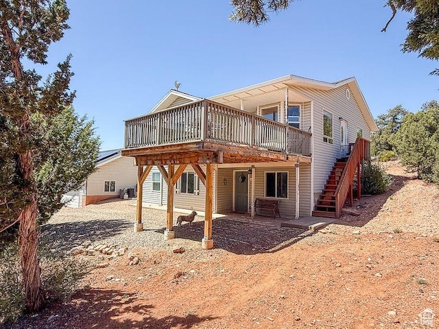 425 E Mule Deer Rd, Central, UT 84722 - back of house featuring a deck and stairway