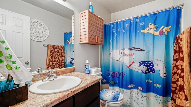 1002 W Stonehaven Dr Unit 108, North Salt Lake, UT 84054 - bathroom featuring vanity, toilet, and a shower with curtain