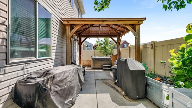 1002 W Stonehaven Dr Unit 108, North Salt Lake, UT 84054 - fenced backyard featuring a hot tub, a gazebo, and a patio area