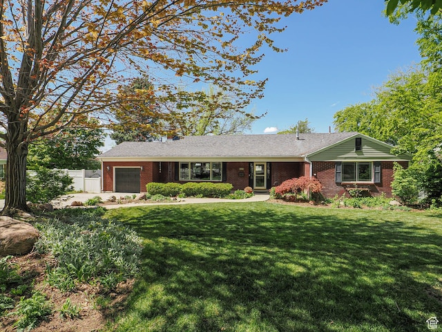 2244 E Laird Way, Salt Lake City, UT 84108 - ranch-style home with a garage and brick siding
