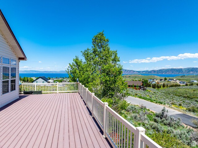 2780 S Bunch Grass Dr Unit 16, Garden City, UT 84028 - wooden terrace with a mountain view