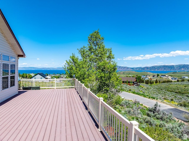 2780 S Bunch Grass Dr Unit 16, Garden City, UT 84028 - deck with a water and mountain view
