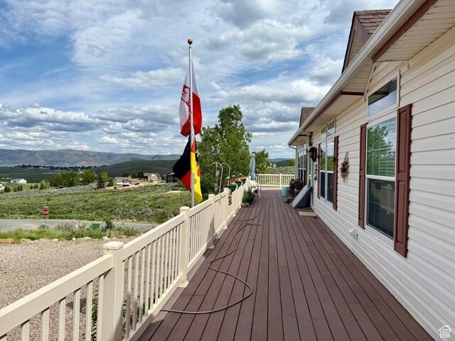 2780 S Bunch Grass Dr Unit 16, Garden City, UT 84028 - wooden terrace with a mountain view