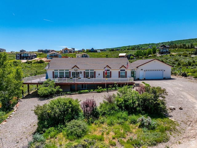 2780 S Bunch Grass Dr Unit 16, Garden City, UT 84028 - ranch-style home featuring driveway and a deck