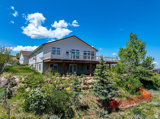 2780 S Bunch Grass Dr Unit 16, Garden City, UT 84028 - rear view of property featuring a wooden deck