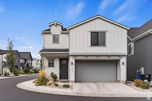 1494 W Lincoln Way, Kaysville, UT 84037 - view of front of property featuring board and batten siding, an attached garage, and driveway