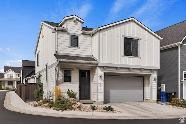 1494 W Lincoln Way, Kaysville, UT 84037 - view of front of house featuring a garage, board and batten siding, and concrete driveway