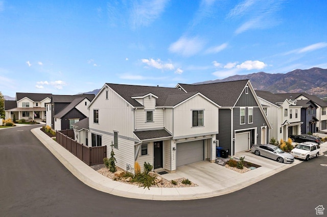 1494 W Lincoln Way, Kaysville, UT 84037 - view of property featuring board and batten siding, a residential view, an attached garage, driveway, and a shingled roof
