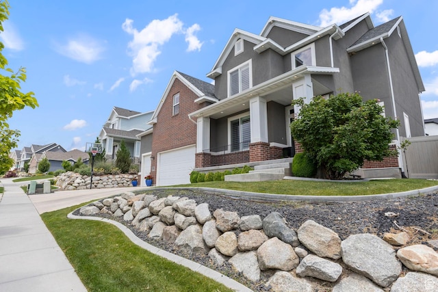 776 W Horizon Dr, Lehi, UT 84043 - view of home's exterior featuring brick siding, a garage, a porch, stucco siding, and driveway