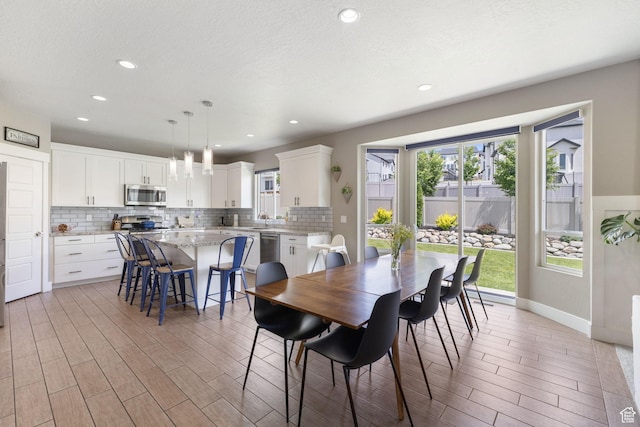 776 W Horizon Dr, Lehi, UT 84043 - dining area featuring light wood finished floors and recessed lighting
