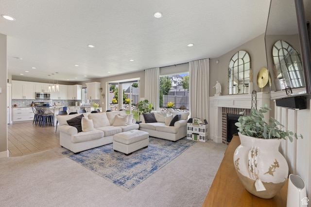 776 W Horizon Dr, Lehi, UT 84043 - living room with carpet flooring, recessed lighting, and a fireplace