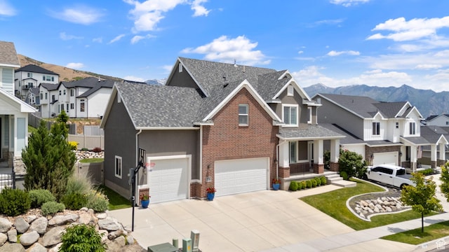 776 W Horizon Dr, Lehi, UT 84043 - view of front of property with a residential view, concrete driveway, brick siding, a mountain view, and a shingled roof
