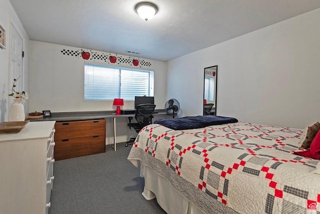 9039 S 1660 E, Sandy, UT 84093 - bedroom with dark colored carpet and a desk