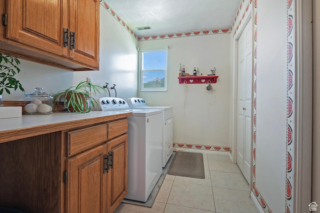 9039 S 1660 E, Sandy, UT 84093 - washroom with cabinet space, light tile patterned floors, and independent washer and dryer