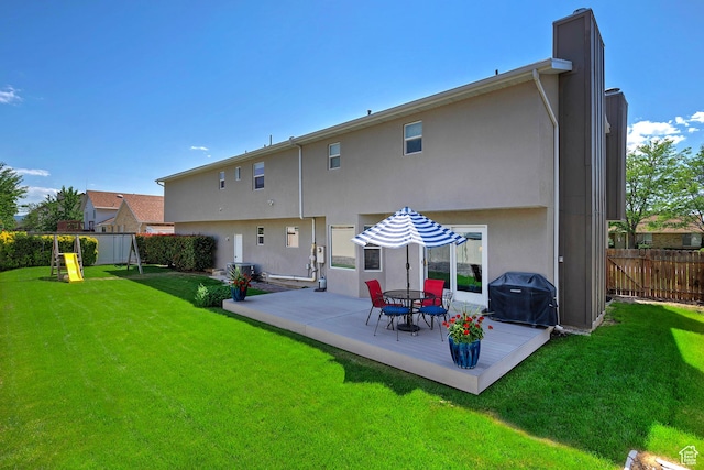 9039 S 1660 E, Sandy, UT 84093 - back of house featuring stucco siding and a patio area