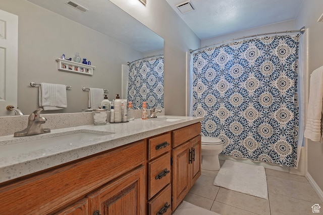 9039 S 1660 E, Sandy, UT 84093 - full bath with tile patterned floors, double vanity, toilet, and a shower with curtain