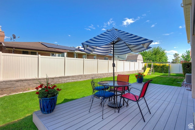9039 S 1660 E, Sandy, UT 84093 - wooden deck with outdoor dining area and a playground