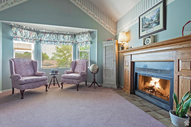 9039 S 1660 E, Sandy, UT 84093 - sitting room with high vaulted ceiling, a tiled fireplace, plenty of natural light, carpet floors, and baseboards