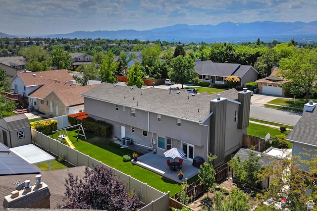 9039 S 1660 E, Sandy, UT 84093 - aerial perspective of suburban area with a mountain backdrop