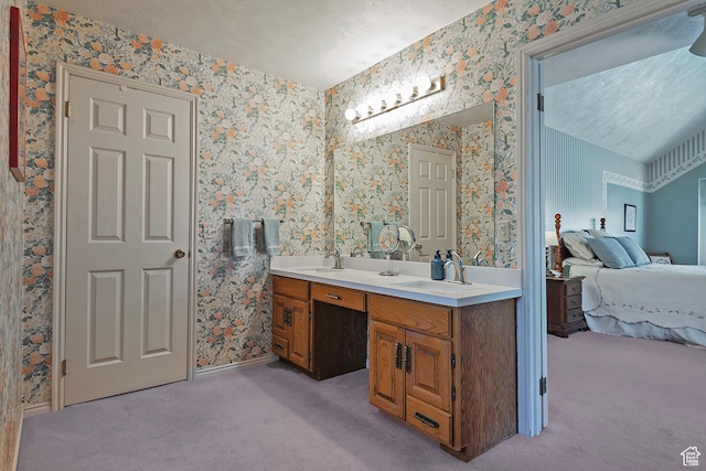 9039 S 1660 E, Sandy, UT 84093 - bathroom featuring wallpapered walls, ensuite bathroom, double vanity, and baseboards