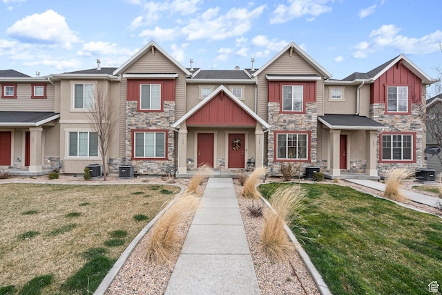 177 E 610 S, Santaquin, UT 84655 - townhome / multi-family property with stone siding, board and batten siding, and a front yard