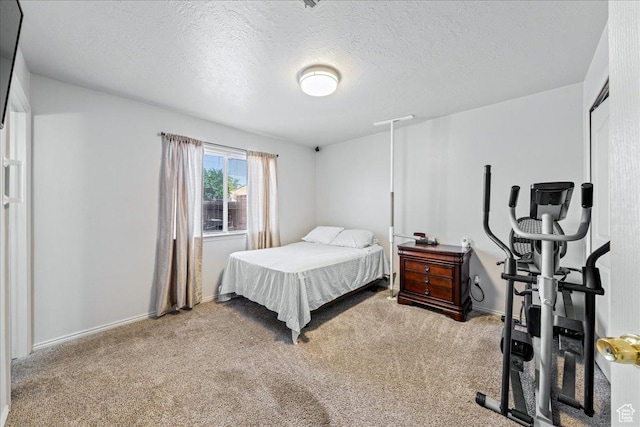 2811 E Paradise Way, St George, UT 84790 - carpeted bedroom featuring a textured ceiling and baseboards