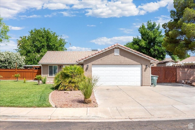 2811 E Paradise Way, St George, UT 84790 - ranch-style house with a tile roof, a garage, concrete driveway, and stucco siding
