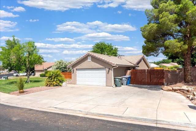 2811 E Paradise Way, St George, UT 84790 - ranch-style home featuring stucco siding, a tiled roof, concrete driveway, and an attached garage