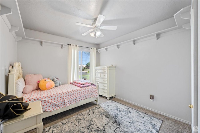 2811 E Paradise Way, St George, UT 84790 - bedroom with light colored carpet, a textured ceiling, baseboards, and ceiling fan