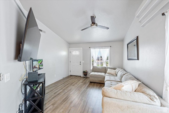 2811 E Paradise Way, St George, UT 84790 - living area with a ceiling fan, light wood finished floors, and baseboards