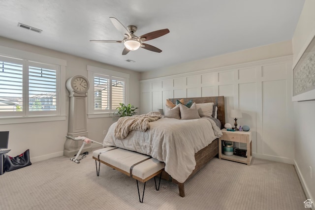 14496 S Edgemere Dr W, Herriman, UT 84096 - bedroom featuring baseboards, light carpet, and a ceiling fan