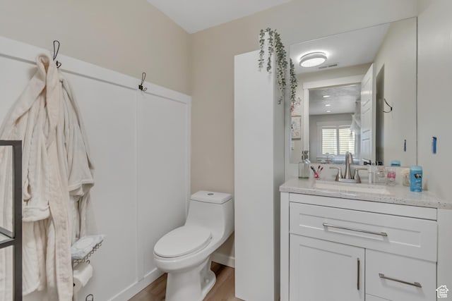 14496 S Edgemere Dr W, Herriman, UT 84096 - bathroom with toilet, wood finished floors, and vanity