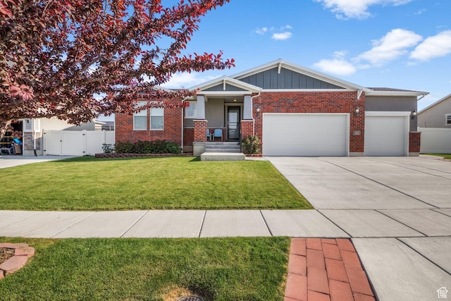 1458 W 600 S, Syracuse, UT 84075 - view of front facade with a garage, driveway, a gate, board and batten siding, and brick siding