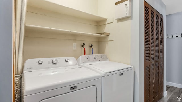 22 Creekside Ln, Centerville, UT 84014 - washroom featuring wood finished floors, washer and dryer, and baseboards