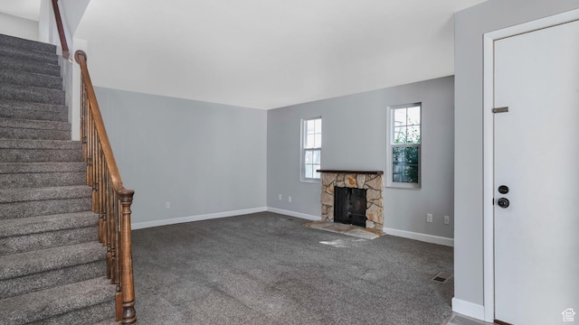22 Creekside Ln, Centerville, UT 84014 - unfurnished living room with stairs, baseboards, carpet floors, and a fireplace