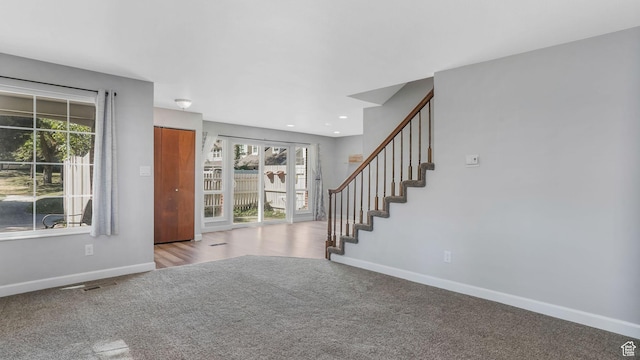 22 Creekside Ln, Centerville, UT 84014 - carpeted foyer entrance with baseboards and stairway