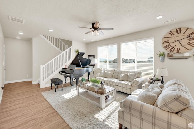 3154 S Edgewater Ln W, Syracuse, UT 84075 - living area with light wood-style flooring, a ceiling fan, stairway, recessed lighting, and baseboards