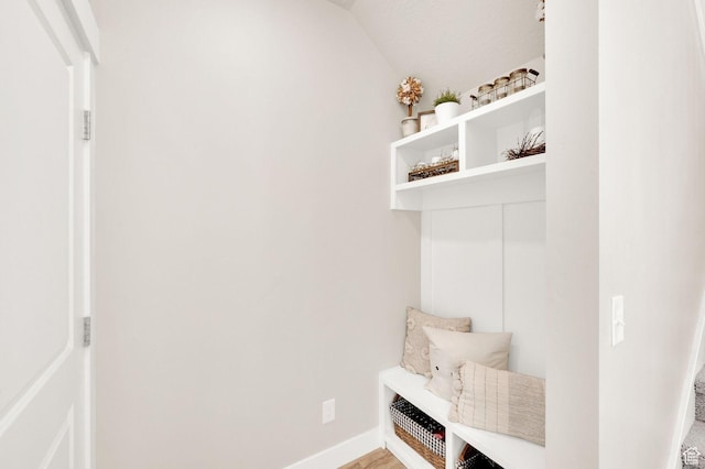 3154 S Edgewater Ln W, Syracuse, UT 84075 - mudroom featuring lofted ceiling, baseboards, and wood finished floors
