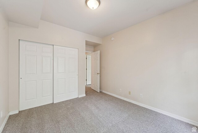 150 S 800 E Unit A9, Salt Lake City, UT 84102 - unfurnished bedroom with carpet, baseboards, and a closet