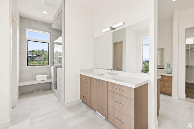 7175 Lupine Dr, Park City, UT 84098 - bathroom with vanity, healthy amount of natural light, baseboards, and a shower with shower door